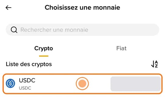 Binance, « Choisissez une monnaie » : ligne USDC encadrée (solde masqué)